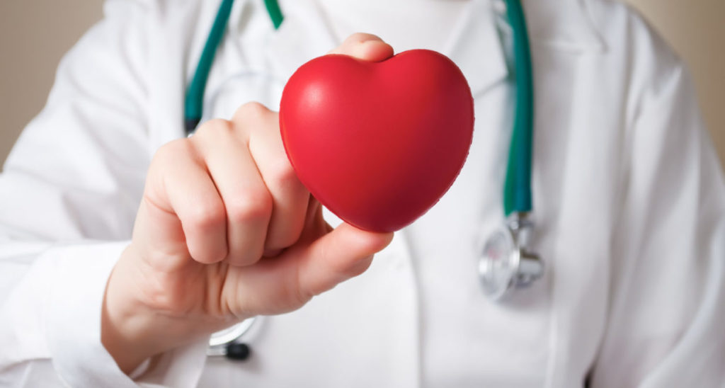 Heart in doctor's hand